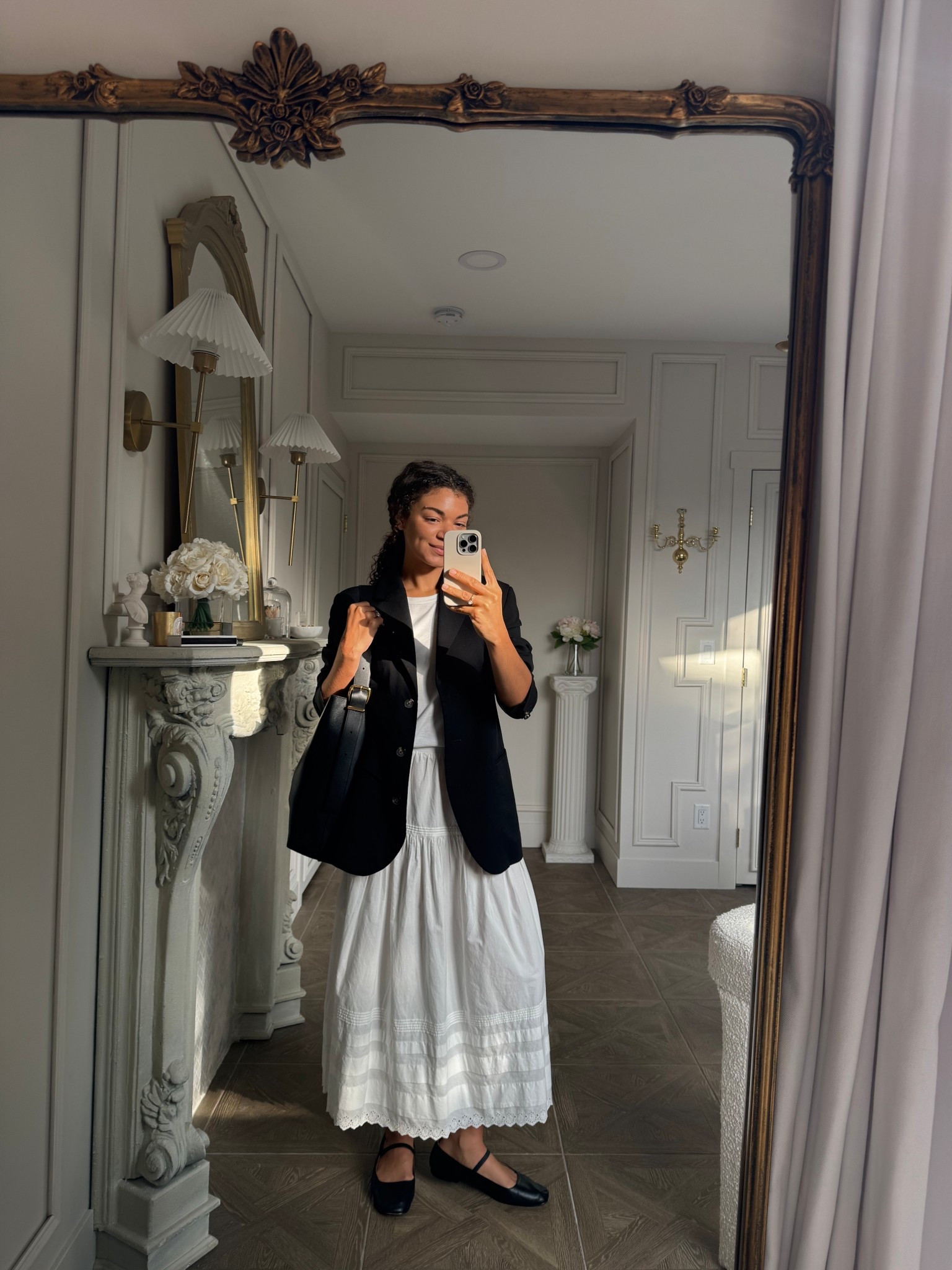 White skirt outfit with a white tank top, Mary Jane flats, blazer, and bucket tote 

#LTKootd