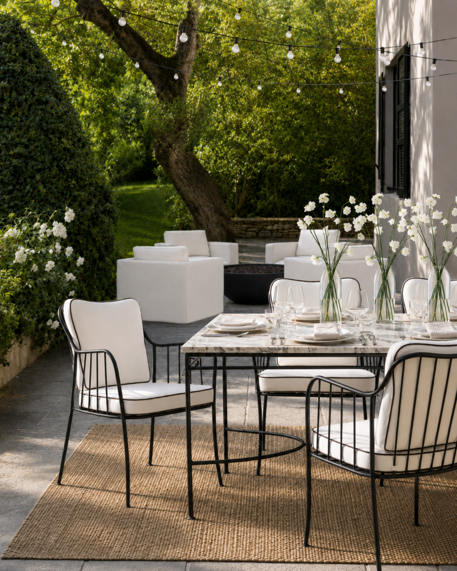 Outdoor dining, but make it feel like an actual room. A woven rug grounds the table, black metal chairs add contrast, and simple white place settings keep everything feeling clean, relaxed, and elevated.

I may receive a commission from purchases made through these links. 

 #LTKHome