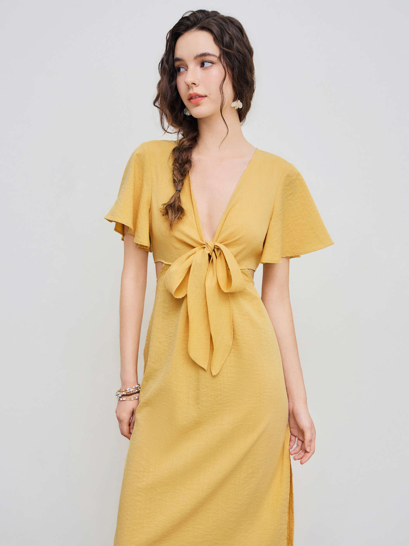 Solid Bow Cut Out Midi Dress... | Cider