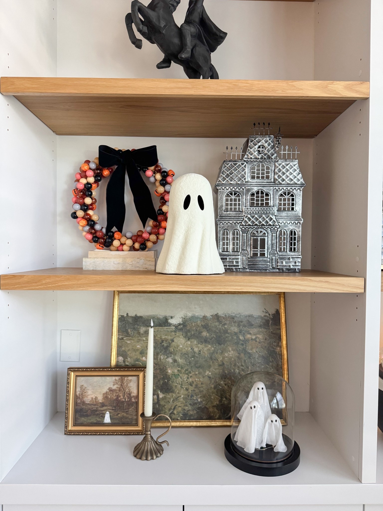 Halloween bookshelves 🖤 

#LTKSeasonal #LTKHome #LTKFindsUnder50