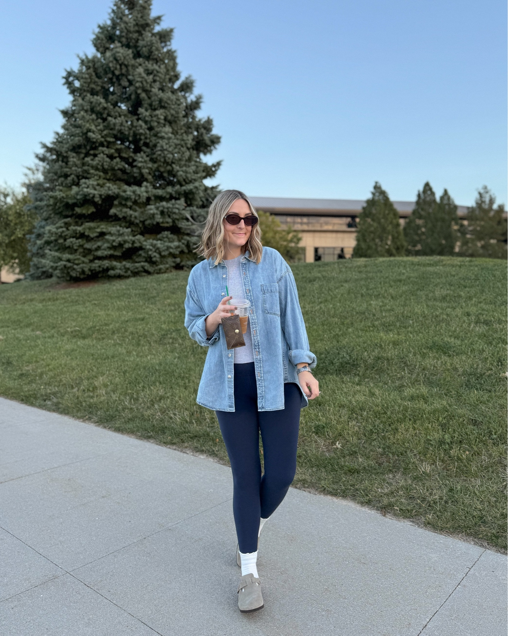 Coffee run outfit 👌🏻☕️
Whole look is Aritzia - love this oversized denim button down shirt and their leggings are buttery soft and so comfy!  
I size down in the denim top, TTS 8 in leggings, medium tee #aritzia 

#LTKFindsUnder100 #LTKStyleTip #LTKActive