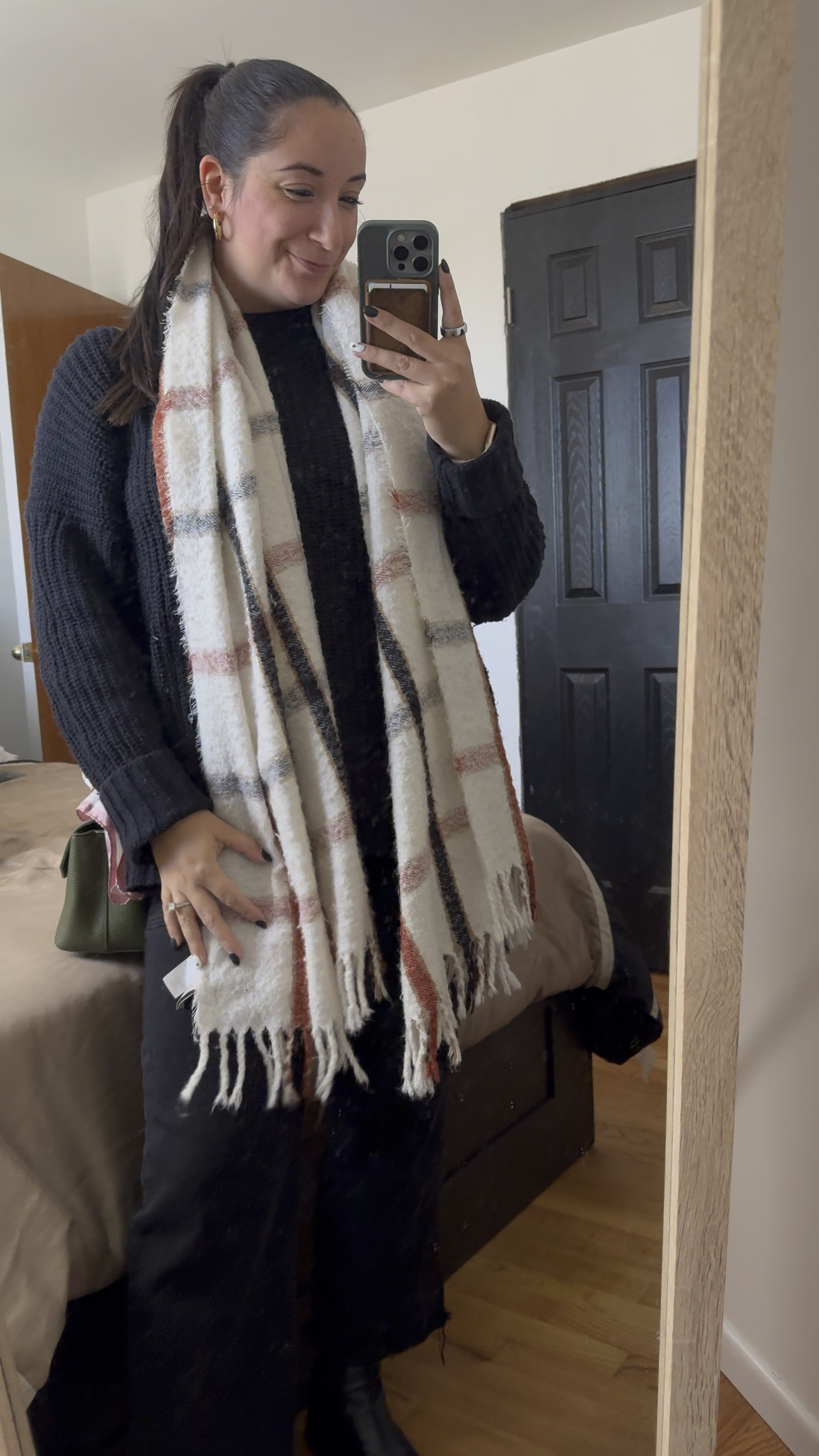 NYC vibes meet cozy layers ❄️✨ 

You can never go wrong with an all-black outfit and a pop of color. 

Wrapped up in warmth and style for those crisp city days, ready to take on the season one chic step at a time! 🖤🗽 

#NYCStyle #WinterInTheCity #EffortlesslyChic #LayerUp

#LTKStyleTip #LTKMidsize #LTKTravel