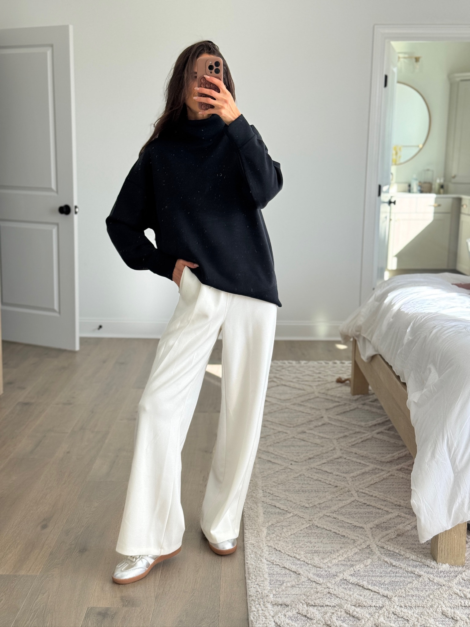 Black oversized sweater paired with relaxed wide leg pants for an effortless, elevated everyday outfit. Comfortable, cozy pieces that feel polished but still easy to wear. Perfect neutral look for errands, travel days, casual work settings, or lounging in style. Black sweater outfit, wide leg pants, neutral outfit ideas, casual chic style, minimalist outfit, everyday comfortable wear, relaxed fit clothing, modern casual look.

#LTKFindsUnder50 #LTKstorytime #LTKootd