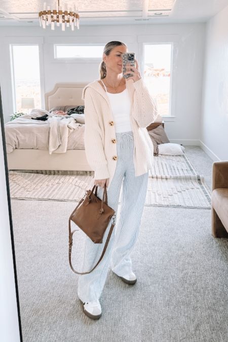 If you’re tall and want some linen striped pants that actually have plenty of length, I found the best pair from Cotton On! These ribbed tanks from amazon are a great staple too. My go to brown leather purse from Able and my go to Adidas (half the price of sambas but look almost identical!) and finally, the cardigan I wear with everything from free people!

#LTKstyletip #LTKSeasonal #LTKshoecrush