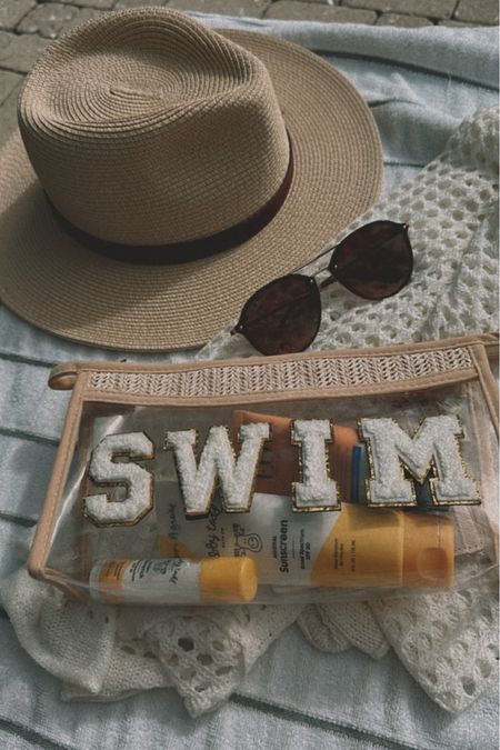 Beach essentials
Beach hat
Sunglasses
Swim bag