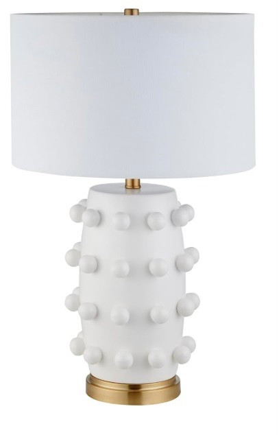 Highly rated textured ceramic table lamp. Cozy home style. Affordable house accessories. Lighting  

#LTKHome #LTKFindsUnder100