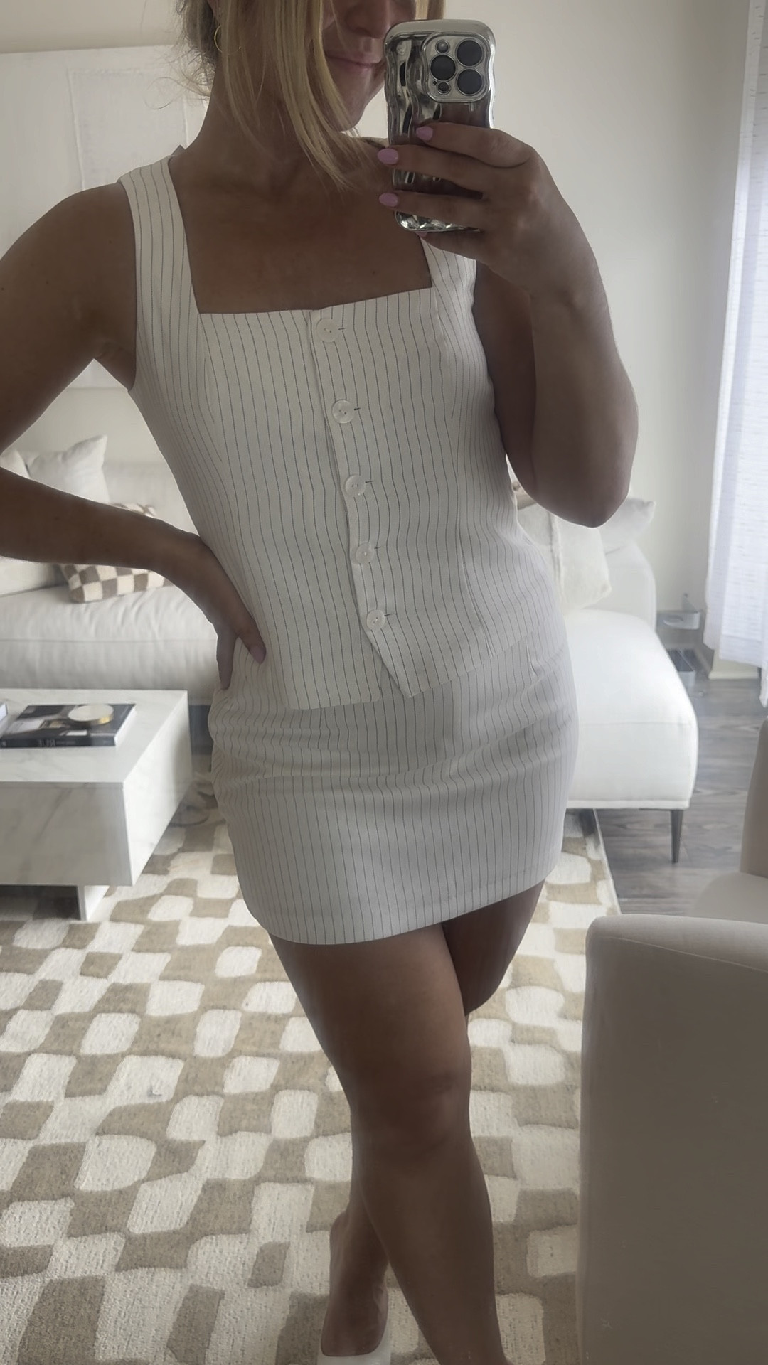 The cutest pinstripe top & skirt set! Skirt has built in shorts and top has functional buttons all the way up the front. Currently on sale! 

#LTKfindsunder100 #LTKsalealert #LTKSpringSale