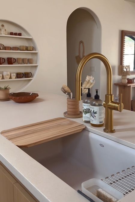 Modern earthy kitchen - desert kitchen - minimal kitchen - brass gold faucet - Kohler Crue faucet - sink cutting board 

#LTKhome