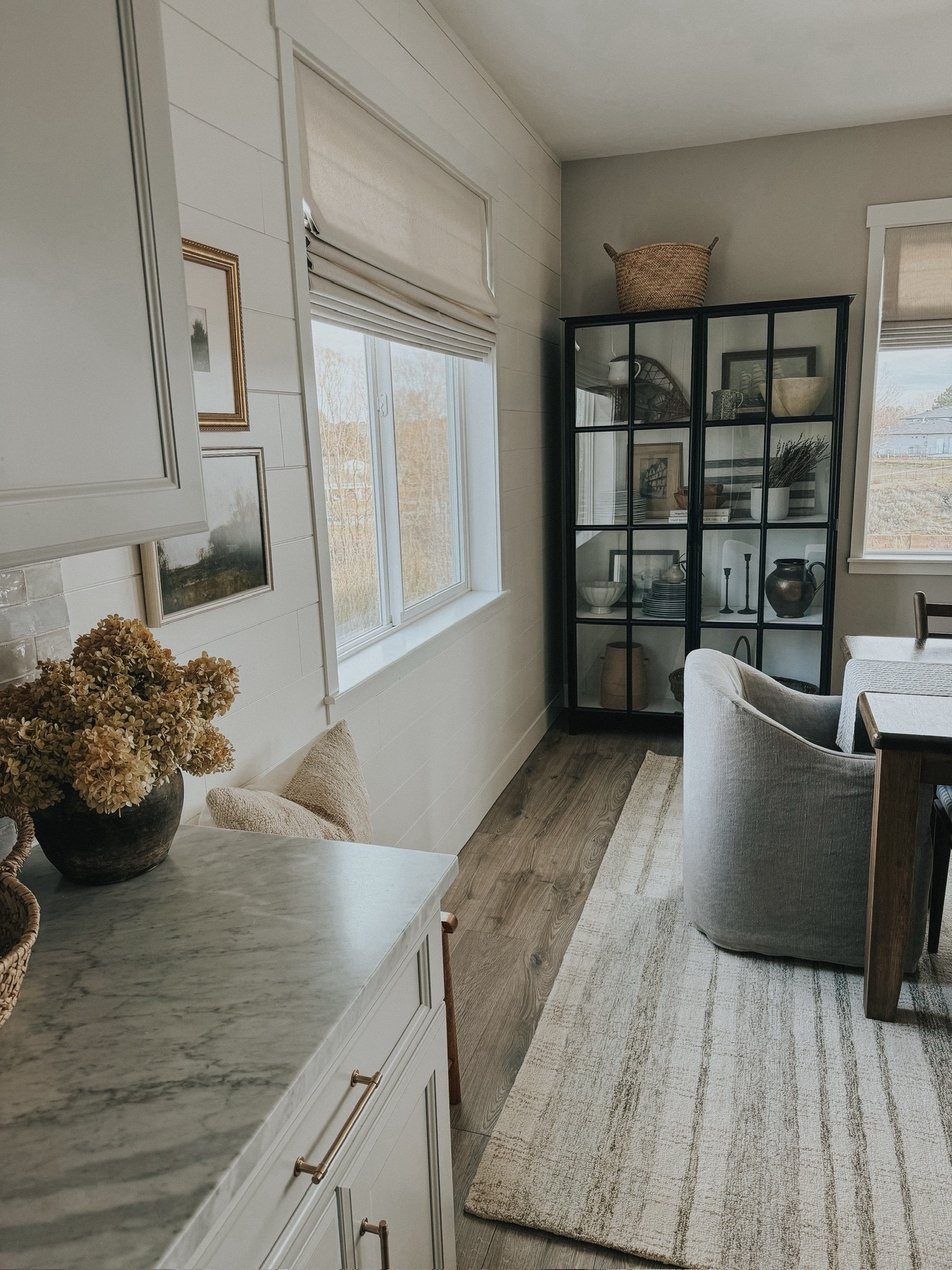 This black cabinet is one of my favorite furniture pieces. I love the white inside and the grid door panels. It’s one of my favorite pieces to style! 

#LTKStyleTip #LTKHome