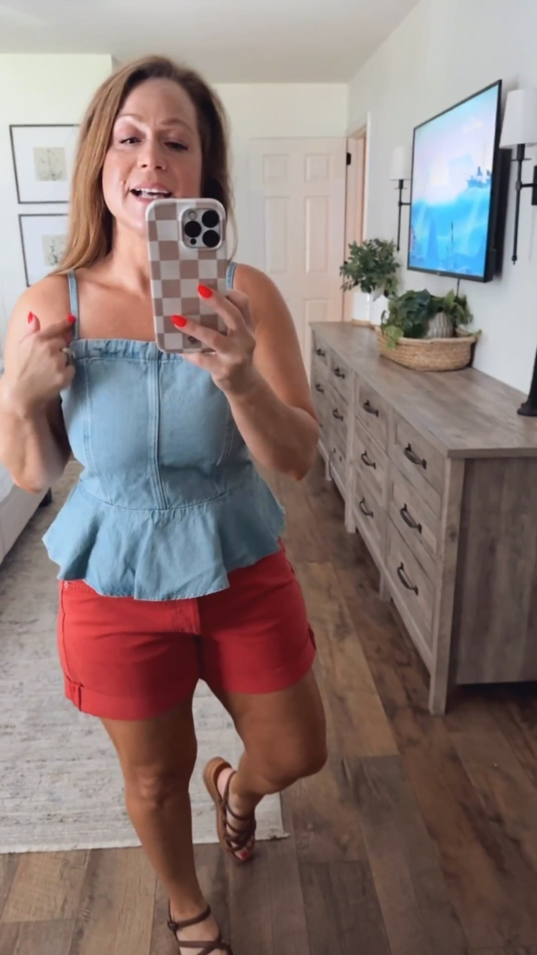 Summer outfit idea 
Denim top with ruffle hem detail 
Denim shorts with cuffs and button fly
Sandals

#LTKootd #LTKPetite #LTKOver40