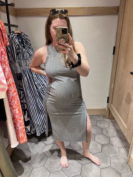 Love this racerback tank dress! So good with a bump or without. I am wearing a medium. This style runs big so I would size down. 

#LTKbump #LTKSpringSale