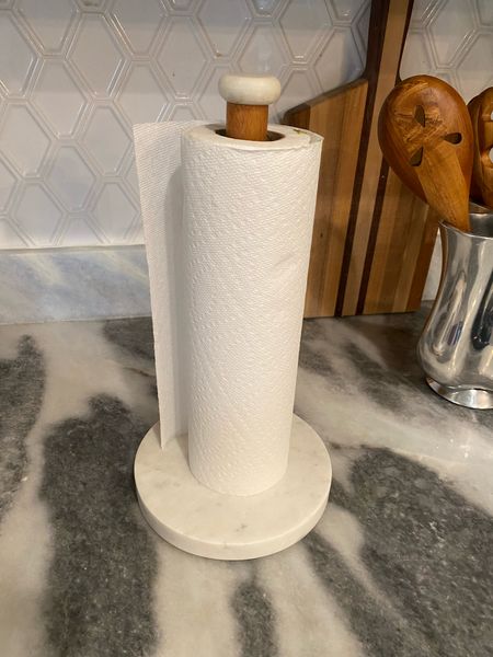Target marble paper towel holder with wood.  It also comes in grey marble

#LTKsalealert #LTKfamily #LTKunder50