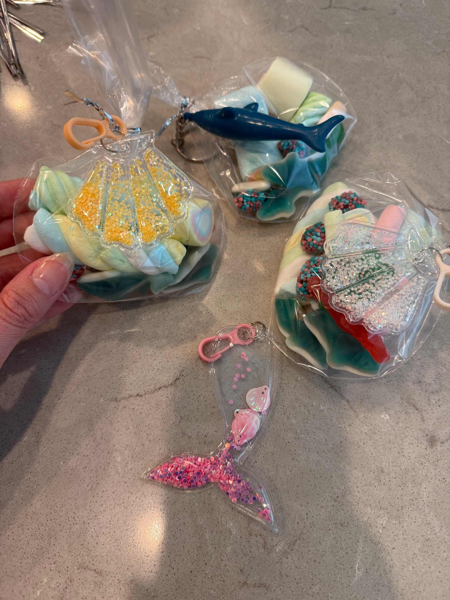 Ocean themed party tray bags on a budget! These keychains are the perfect touch to a baggie filled with sea inspired sweets 🐚 🦈 🐟 