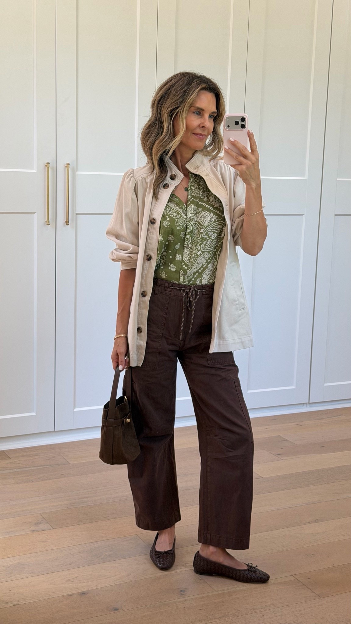 I’m 5’6
-cotton colored button up jacket XS
-green and cream blouse XS
-brown drawstring jeans 25
-small brown bag
-woven ballet flats 6.5
