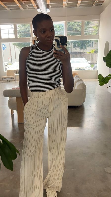 Affordable Neutral spring outfit! Cream linen pinstriped pants, sleeveless knit striped top, white floral sandals and gold drop earrings. 

#LTKfindsunder50 #LTKfindsunder100 #LTKstyletip
