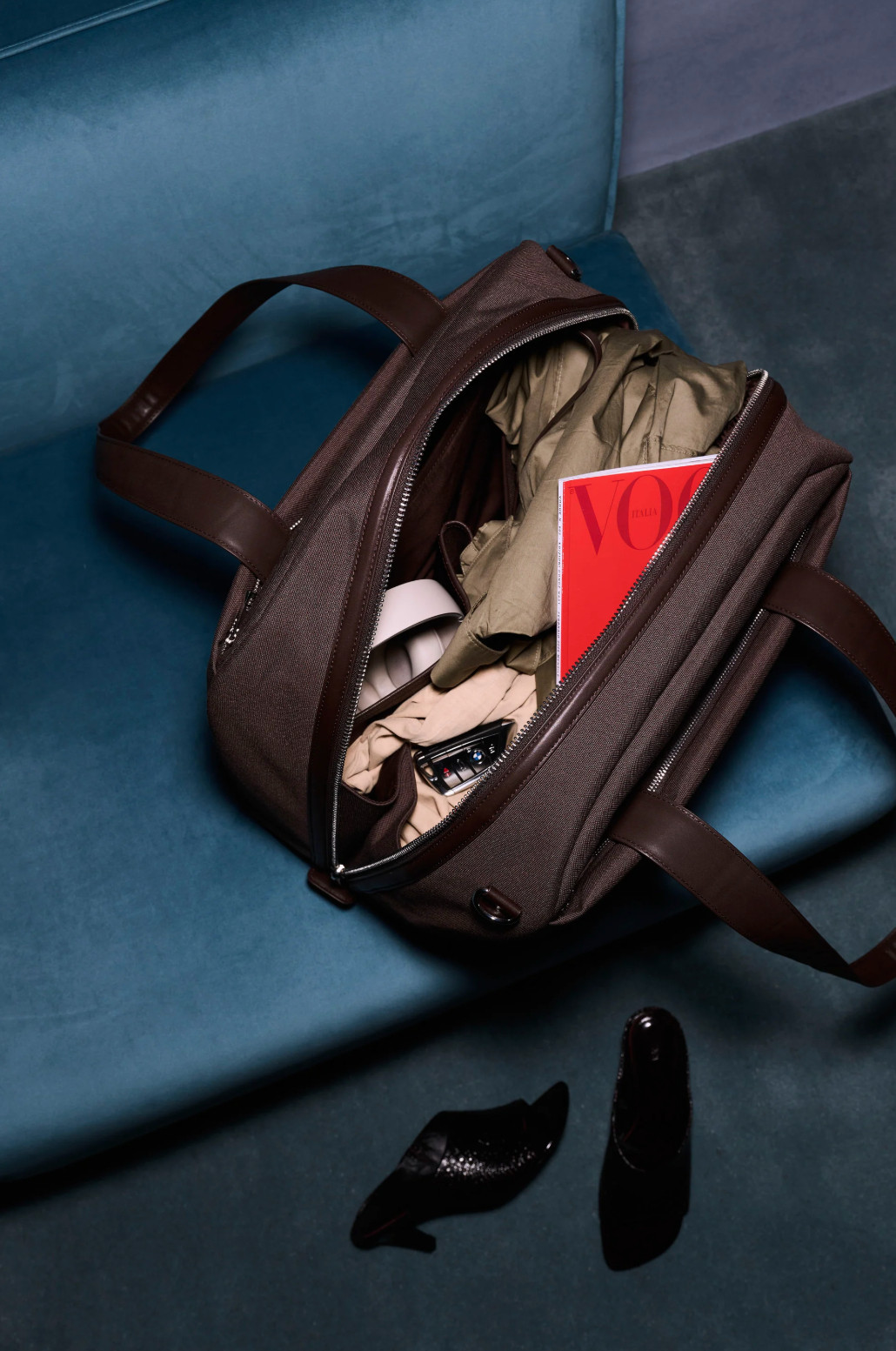 The ultimate travel bag 🤎 The BÉIS The Duffle in Espresso is designed to make travel effortless and organized. I love the wide semi-clamshell opening for easy access, plus all the smart compartments — laptop sleeve, water bottle pocket, front zip pocket, and even a key leash so everything has its place. The structured half-moon shape, leather trim, and padded straps make it as chic as it is functional. Perfect for flights, weekends away, or everyday carry-on use ✨ 

 #LTKdayinmylife #LTKgrwm #LTKTravel