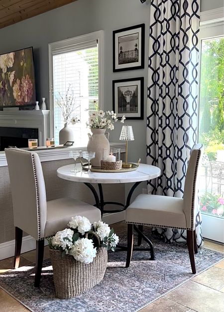 Memorial Day sales and breakfast nook styling! Shop my marble bistro table on sale, area rug, coastal candle, touch light, curtain panels, florals, trays. Summer home decor styling 

#LTKHome #LTKSaleAlert #LTKFindsUnder50