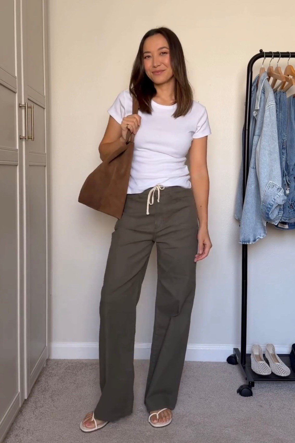 End of summer / early fall outfit 

BR tee — xs 
Paige pants 
Calvin Klein sandals 
Madewell tote 

Casual style / simple outfit / style over 30

#LTKootd