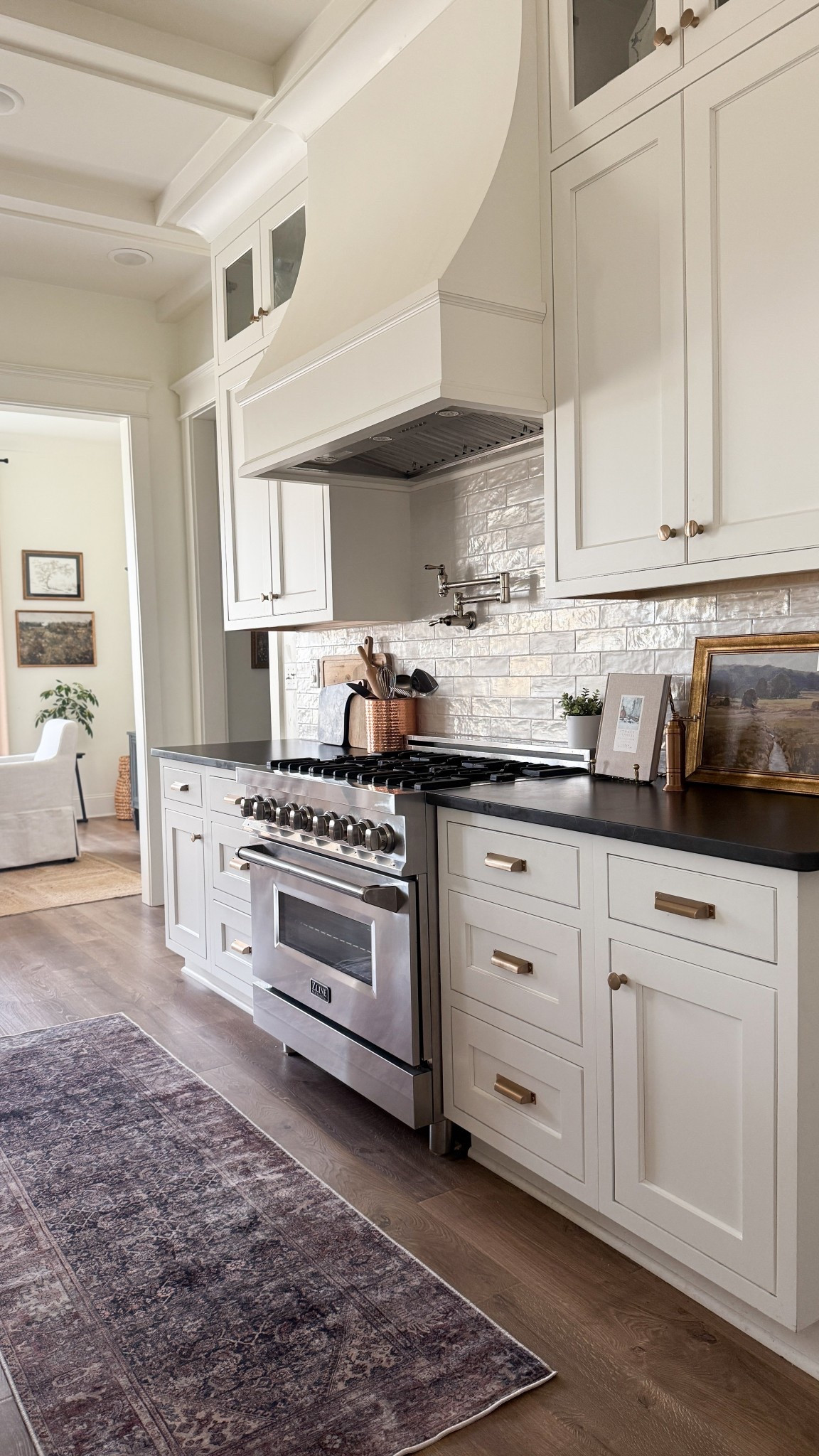Light and airy white kitchen views 🤍 

Paint color: Benjamin Moore White Dove

Rug Runner is Joon Loloi MOREY (unable to link) 