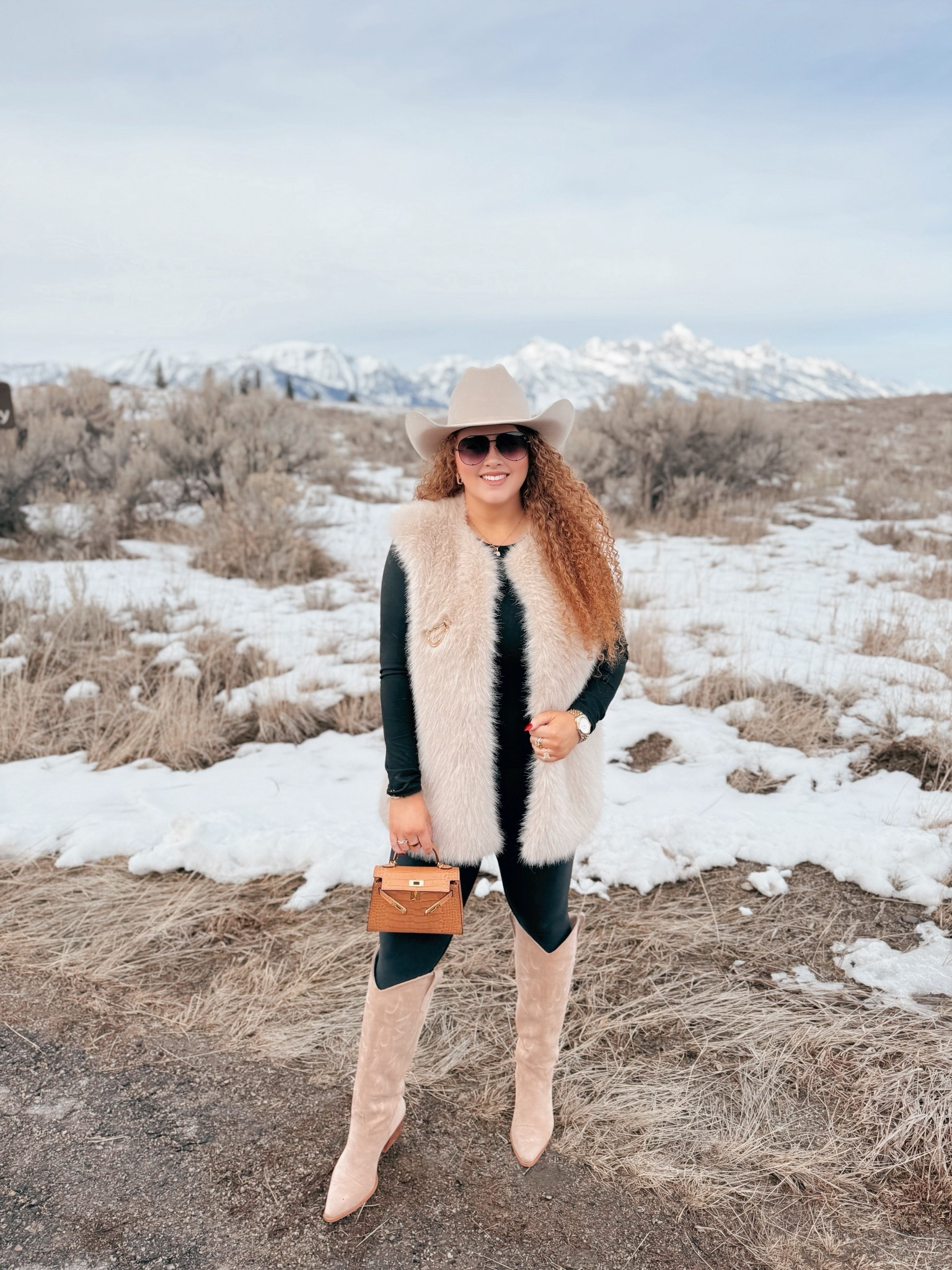 Western winter looks just hit different 🤍🤠 This is one of those outfits that feels easy but still makes a statement ❄️ Cozy layers, western touches, and snow day vibes. Everything I can link is here ✨ western winter outfit | cowgirl hat amazon | beige cowgirl hat | amazon western fashion | black fitted top amazon | western layering outfit | fur vest western look | winter cowgirl style | beige cowgirl boots amazon | amazon cowgirl boots | western snow outfit | casual western outfit | amazon aviator sunglasses | western accessories women | cozy western winter look | western outfit women | amazon fashion western | winter rodeo outfit | modern cowgirl style | cold weather western outfit

#LTKgrwm #LTKMidsize #LTKootd