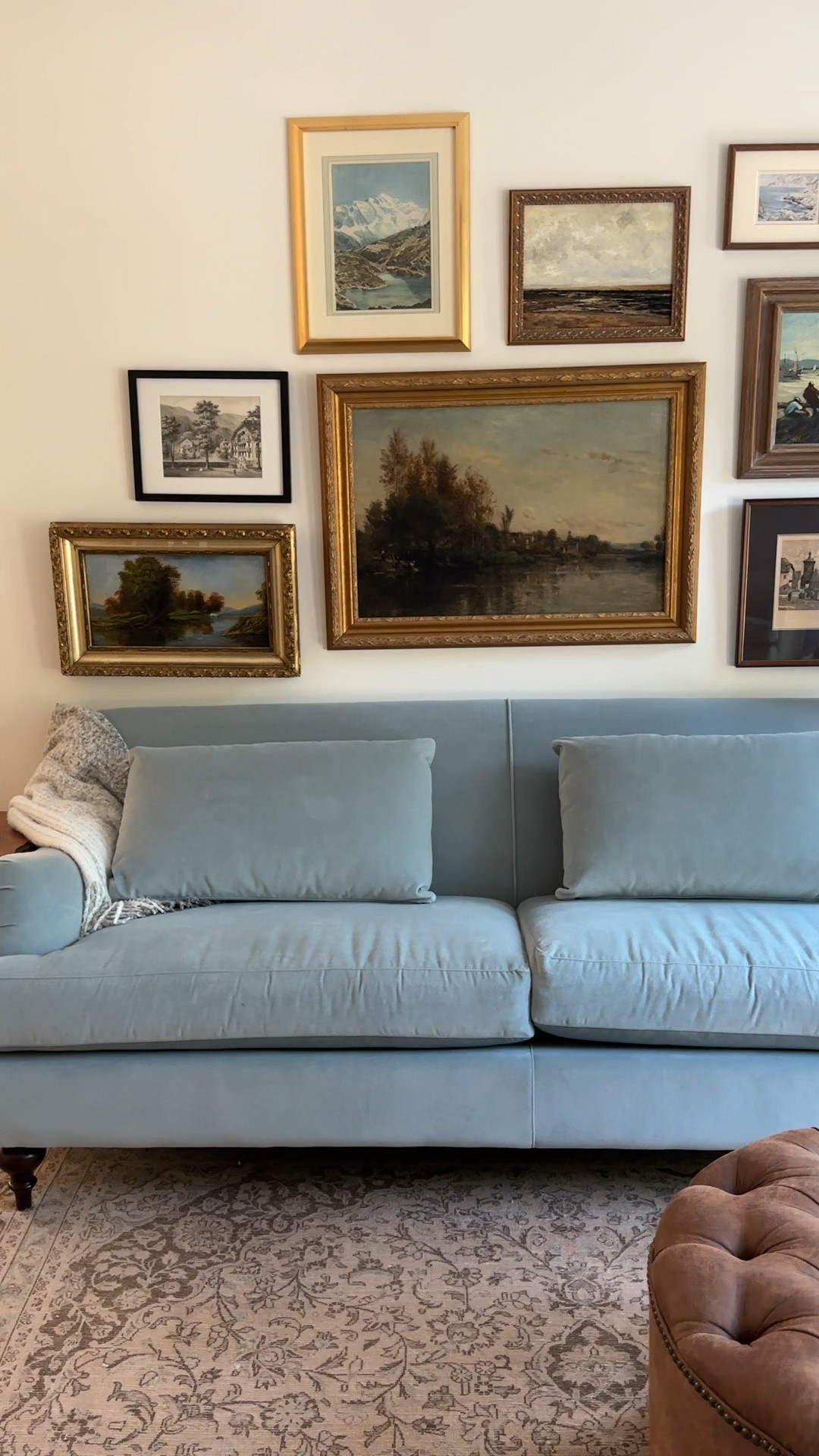 family room details! Blue velvet sofa, gallery wall