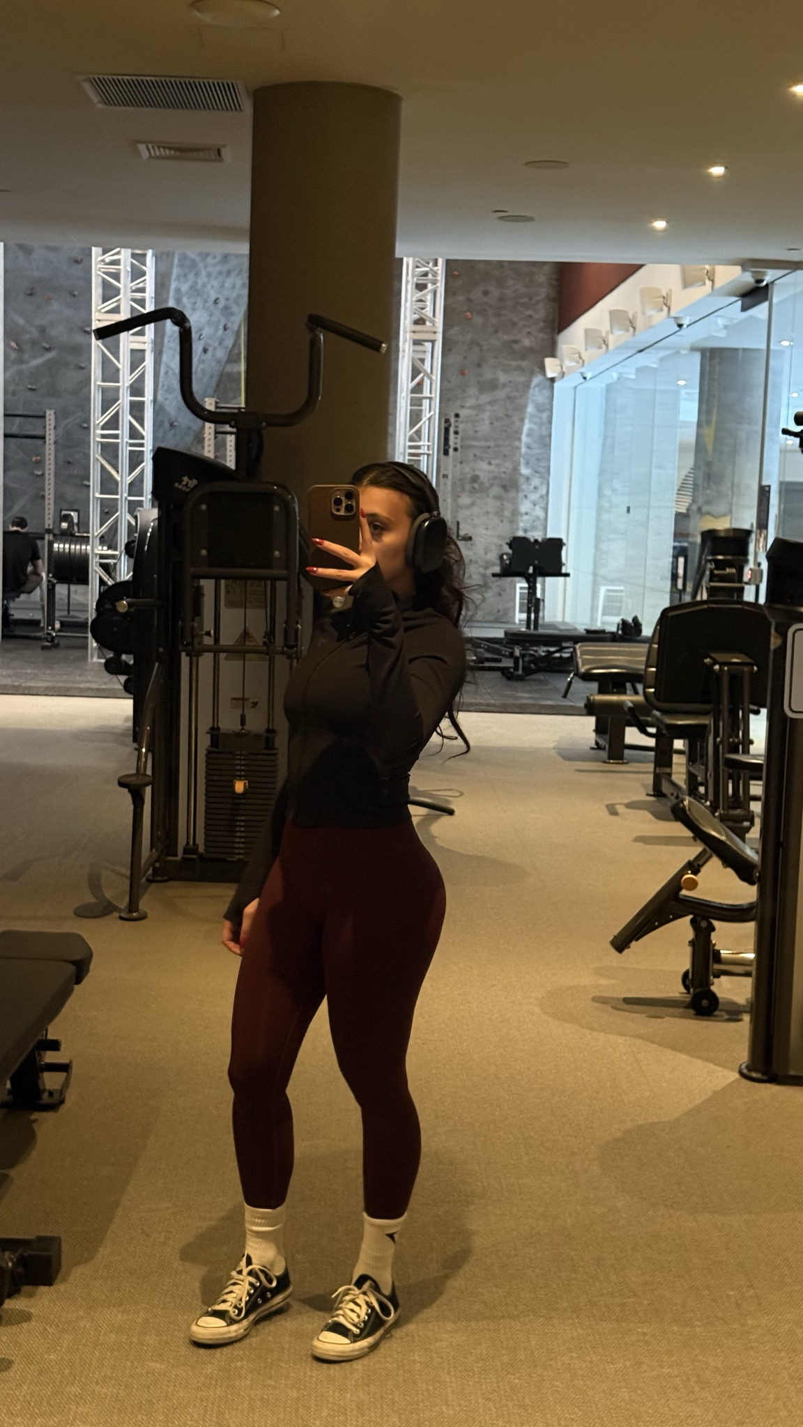 Strong legs & soft glam 🤍 burgundy leggings, fitted zip top, classic Converse. Gym fits can still be cute. #LTKActive #GymLook #AthleisureWear #Gymshark

#LTKgrwm #LTKfitnessgoals #LTKdayinmylife