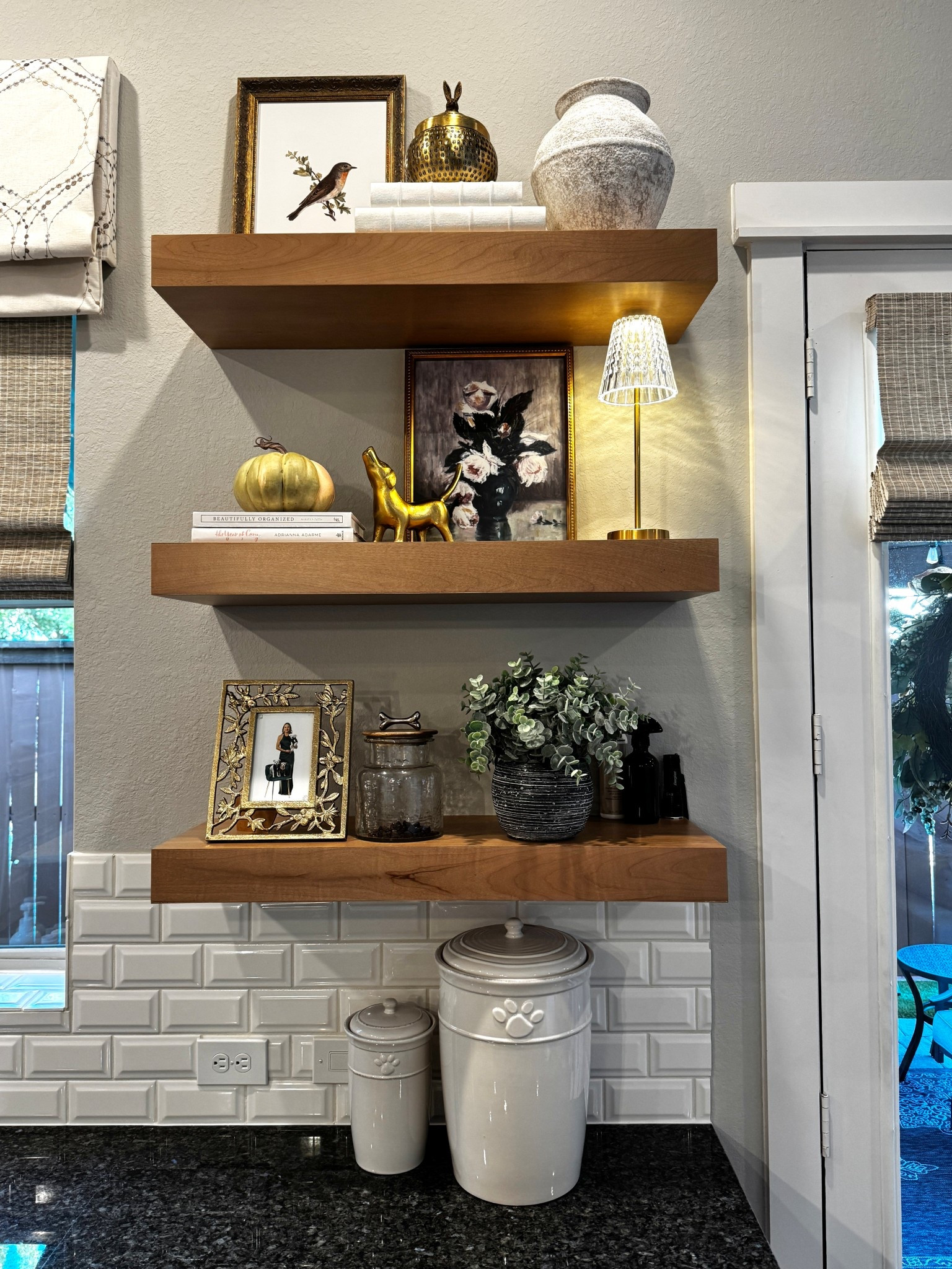 Home Decor - shelf styling

#everypiecefits

Decorations 
Open shelves
Kitchen decor
Pets
Dog
Pet food canister
Decorative 
Coffee table books

#LTKHome #LTKPets