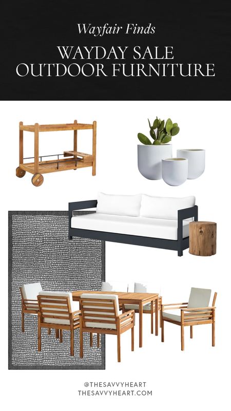 #wayday wayfair, outdoor furniture and decor. Black outdoor sofa with white cushions. Teakwood, dining table and chairs. Modern white rounded planter pots.