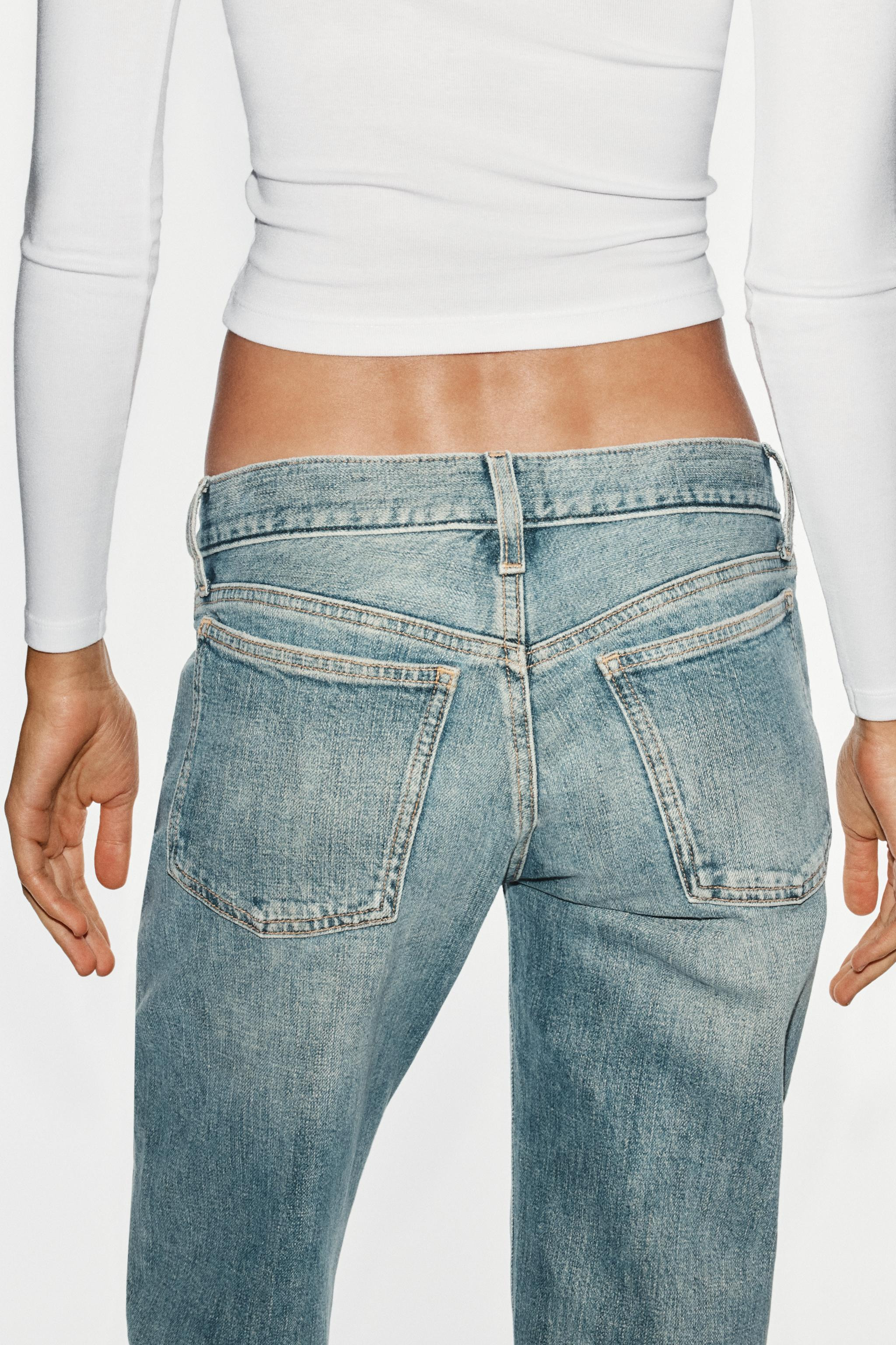 LOW-RISE - SLIM FITLow-rise jeans featuring belt loops and a five-pocket design. Front zip and me... | Zara UK