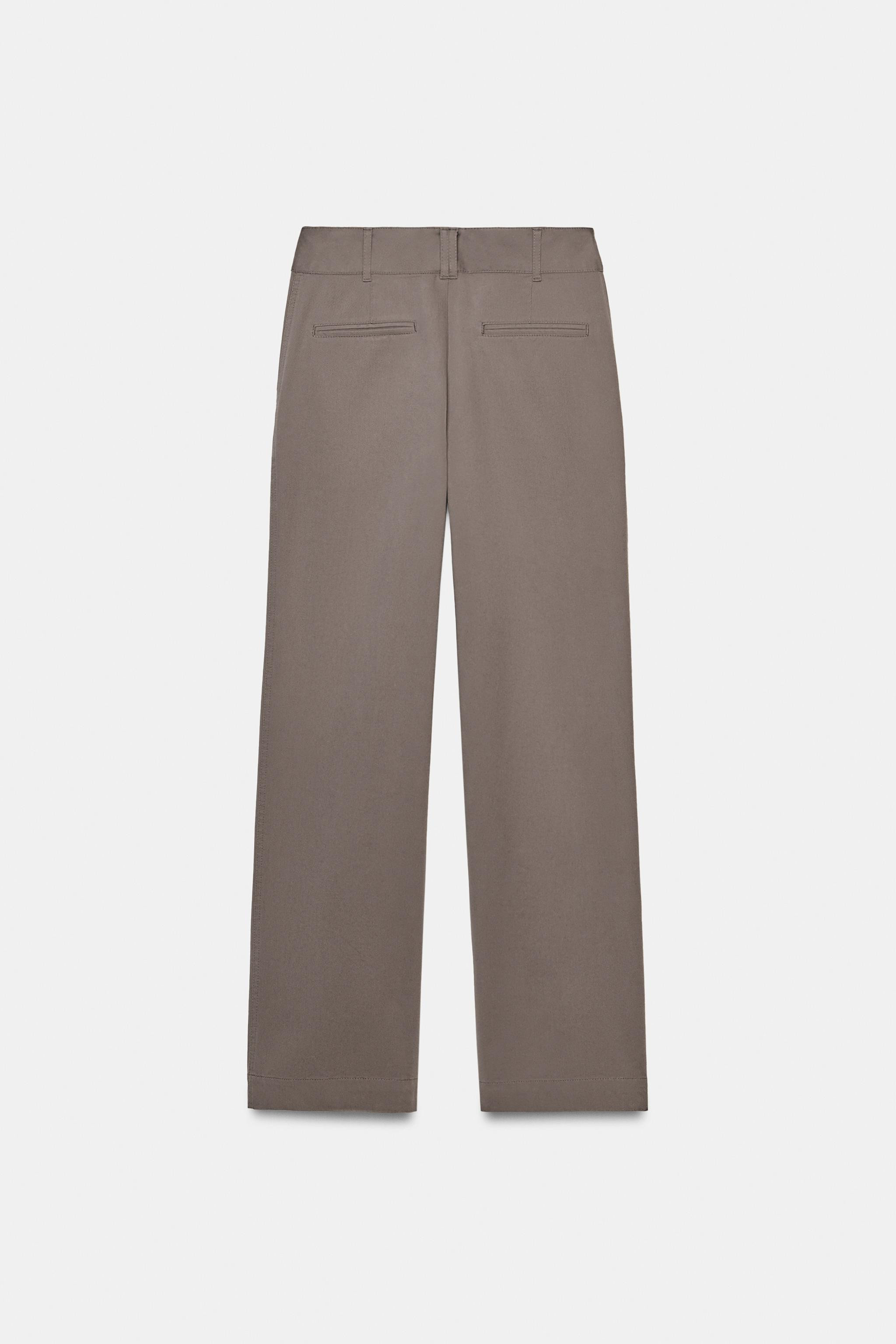 Mid-rise pants with front pockets and back false double-welt pockets. Straight leg. Front zip, in... | Zara US