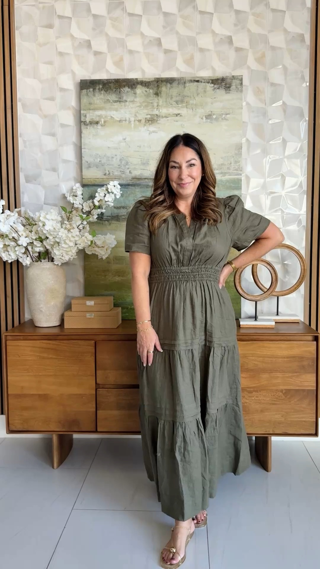 🫒 This olive linen maxi from @Quince does all the work — smocked waist, puff sleeves, and a tiered skirt that skims instead of clings. The split neckline keeps it polished enough for a summer dinner or an outdoor shower.

Wearing size large