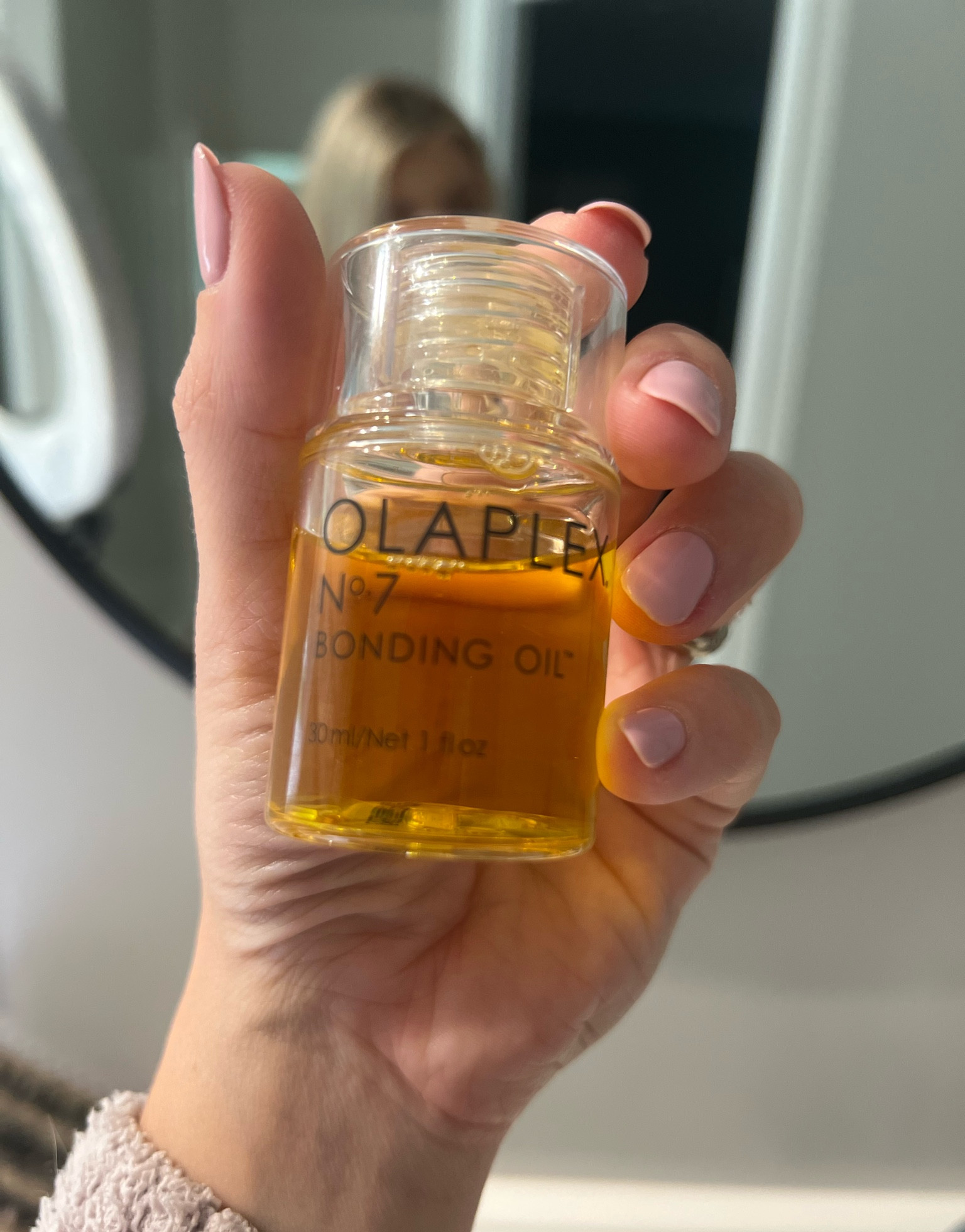 Since last September I stopped washing my hair daily and started washing it  once a week! I’ve seen a huge difference in growth and a lot less breakage. I get my hair salon highlighted 3-4 times a year so the bleach can be harsh. 
I use the Olaplex line for bonding, washing conditioner and deep conditioning. I use this hair oil between washes to keep my ends from getting dry plus it acts as heat protection! 

#LTKFind #LTKbeauty #LTKGiftGuide