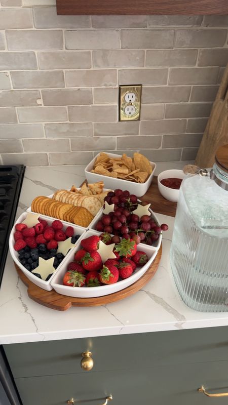 Need a last minute hosting idea for the 4th of July? I got ya! This serving tray/lazy Susan is such a good find and is huge! Love the ribbed glass bevy dispenser too!

#LTKFindsUnder50 #LTKSeasonal #LTKHome