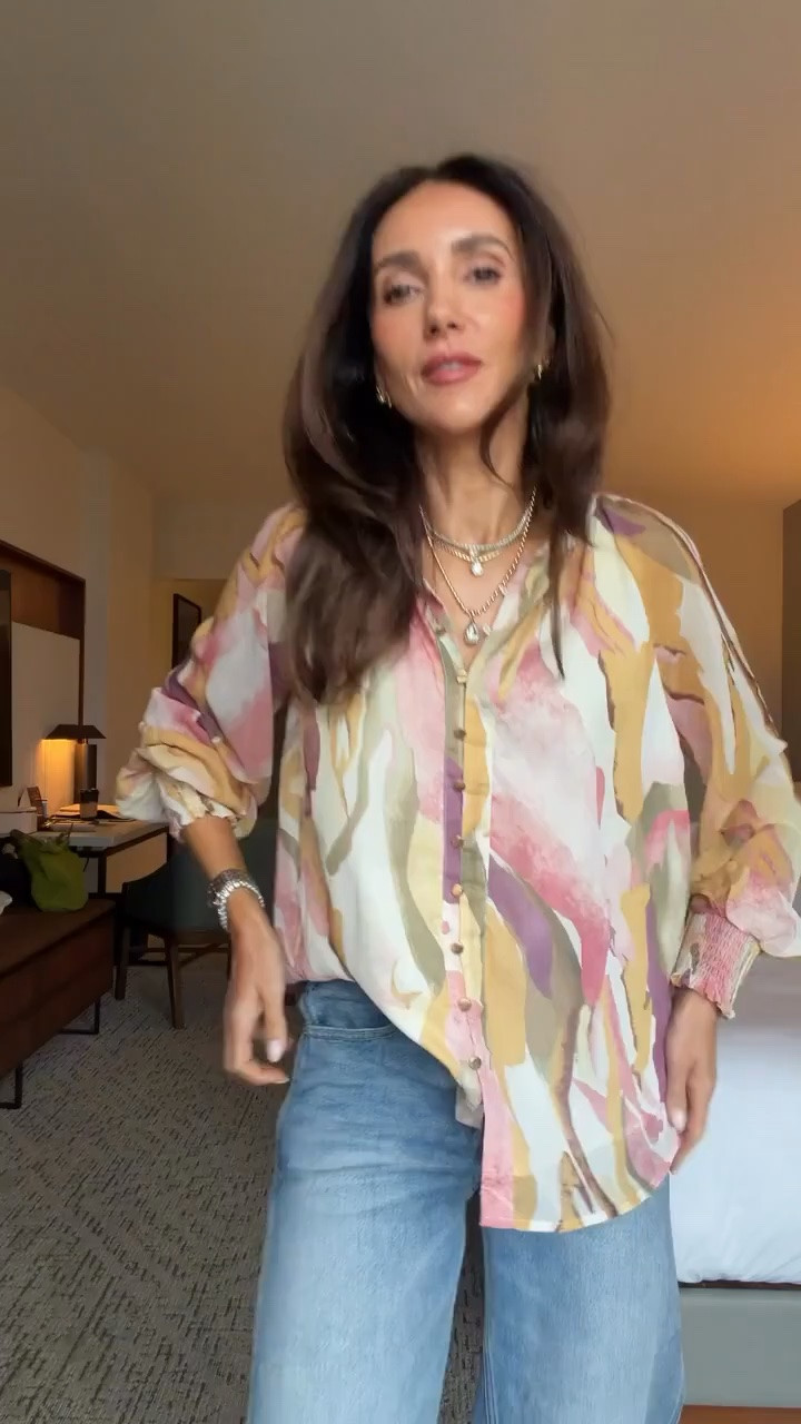 I love a printed blouse that does all the work for an outfit. The soft pink, yellow, and lavender tones are so pretty together, and the relaxed button-down fit looks great with wide leg denim. An easy way to add some color to a casual fall look.
printed blouse, floral blouse, colorful button down, fall blouse, wide leg jeans, casual fall outfit, everyday style, fall fashion, relaxed blouse, denim outfit, transitional outfit, women over 40 fashion, annabrstyle