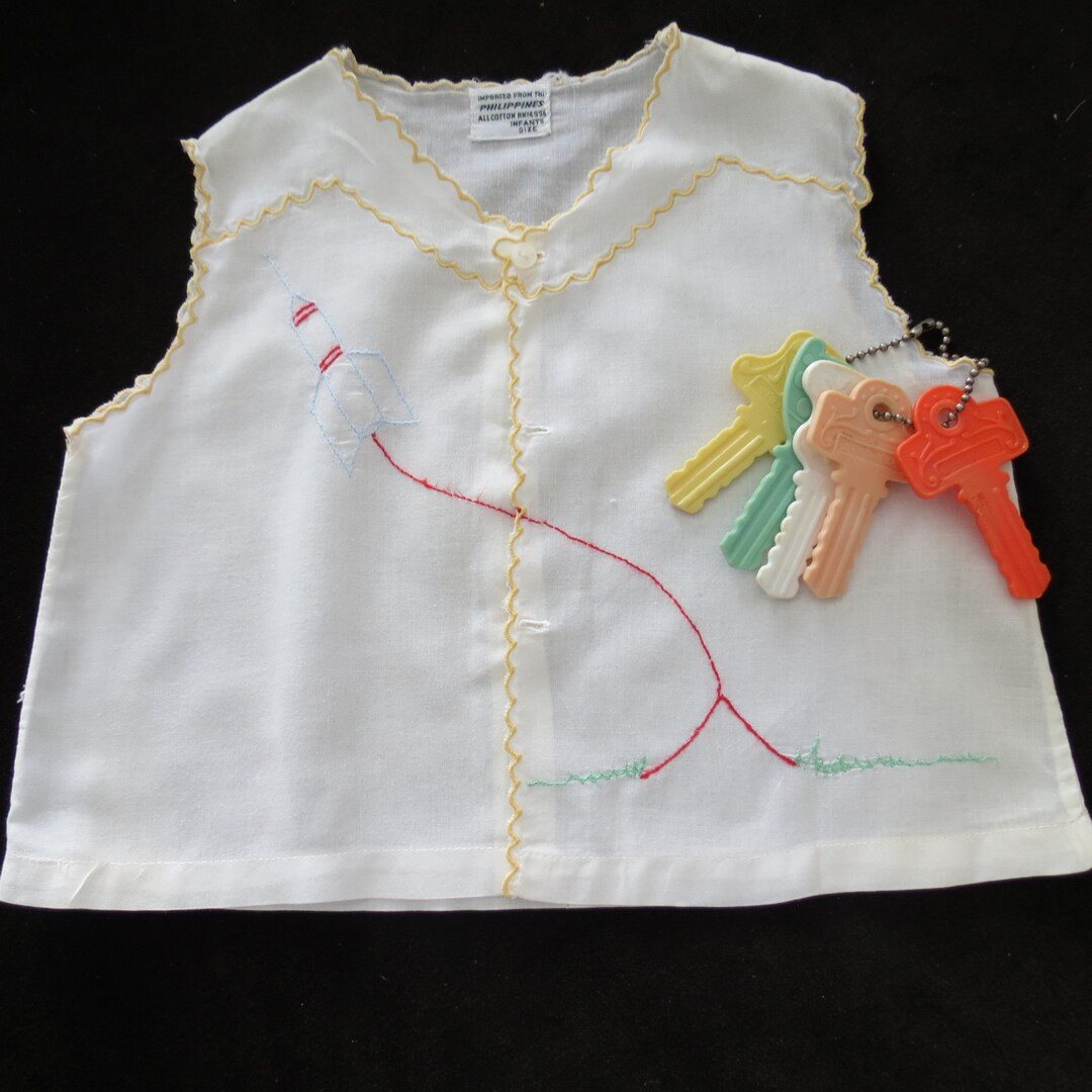 Adorable white (3-6 mon.) vintage baby diaper top/shirt with a darling embroidered rocket.  Perfe... | Etsy (US)