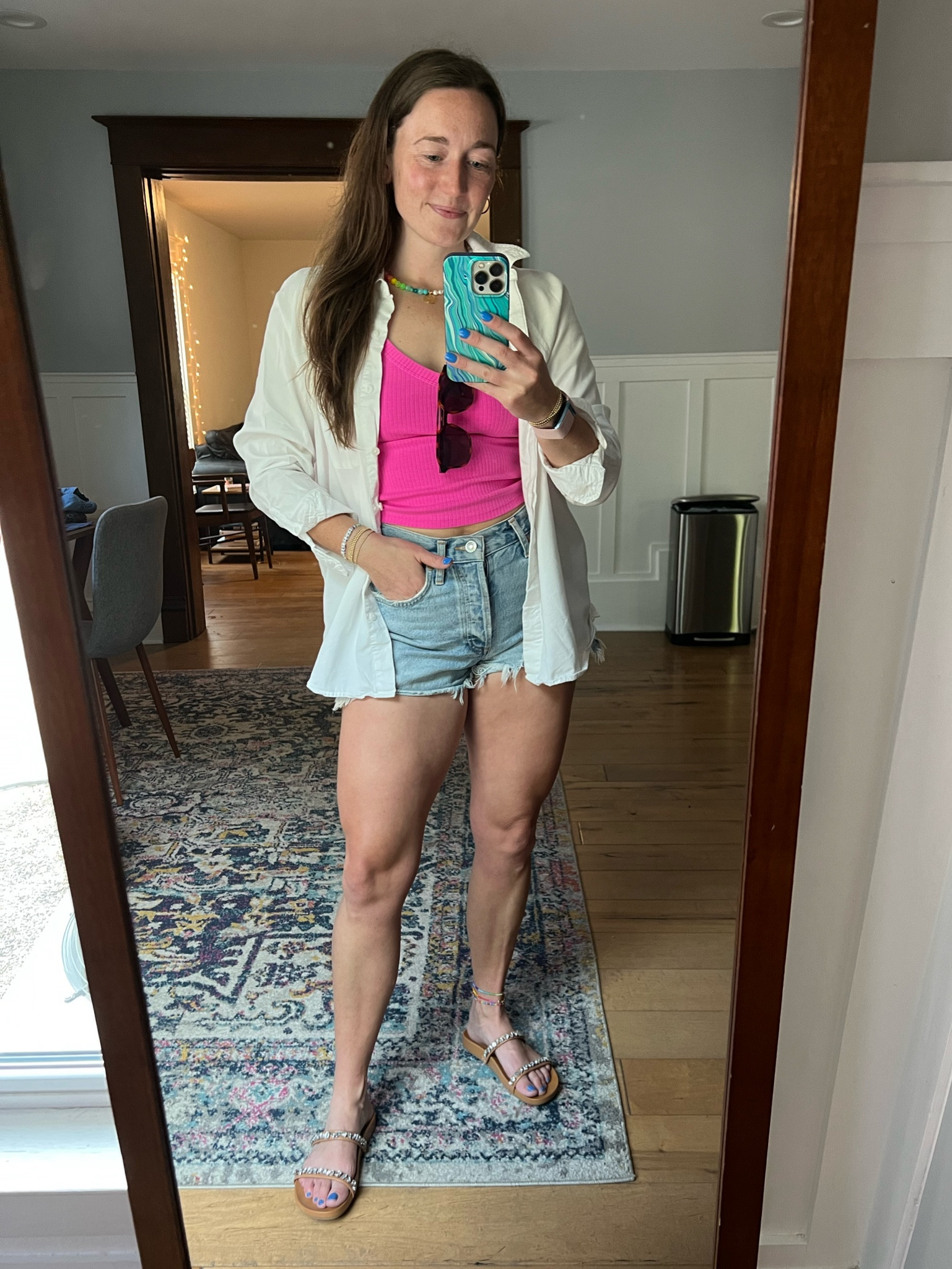 Day 17 of 30 getting dressed with things in my closet. A little colorful, a little classic and a lot comfy to grill out tonight. AGOLDE Parker shorts paired with target tops and sandals. 