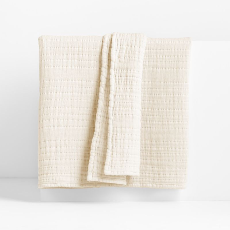 Solid Gauze 70"x55" Arctic Ivory Throw Blanket + Reviews | Crate & Barrel | Crate & Barrel