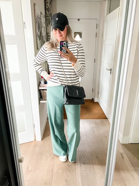 Outfits of the week

A lightweight striped sweater (Zara) paired with sage green wide legged trousers (Zara), high top Fila sneakers, a black initial cap And black YSL bag. 

#LTKeurope #LTKstyletip #LTKcurves