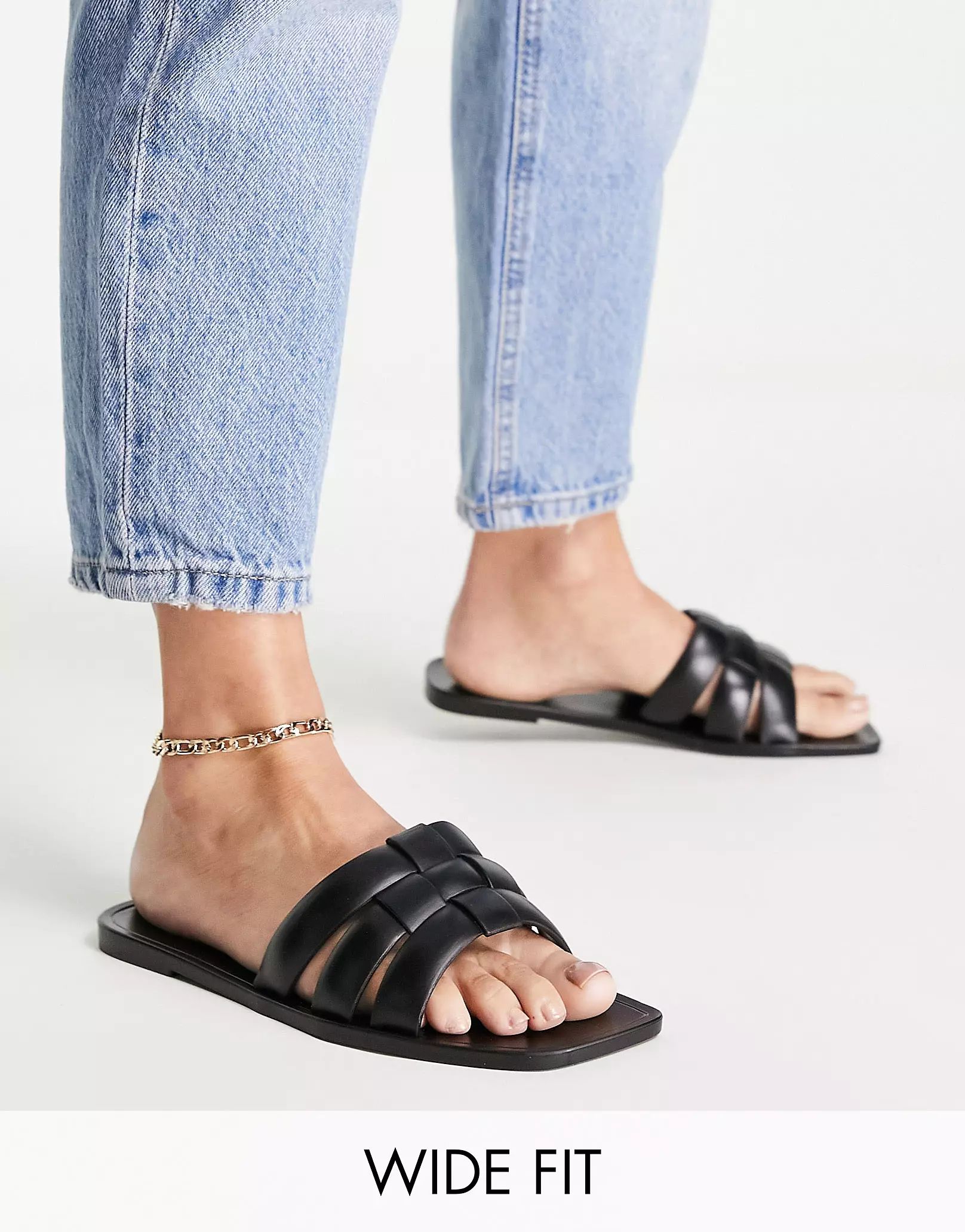 ASOS DESIGN Wide Fit Fame woven jelly flat mules in black | ASOS (Global)
