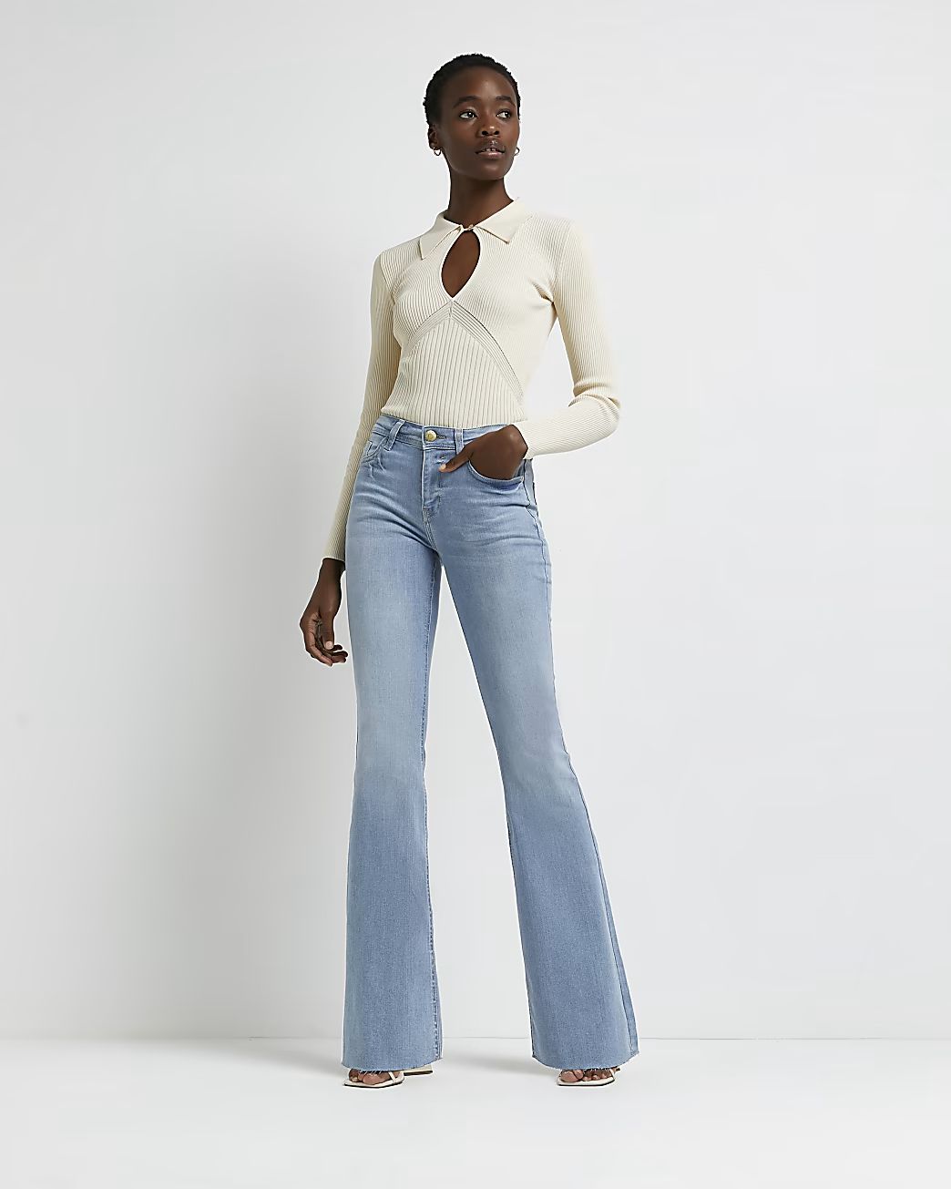 Blue mid rise flared jeans | River Island (UK & IE)