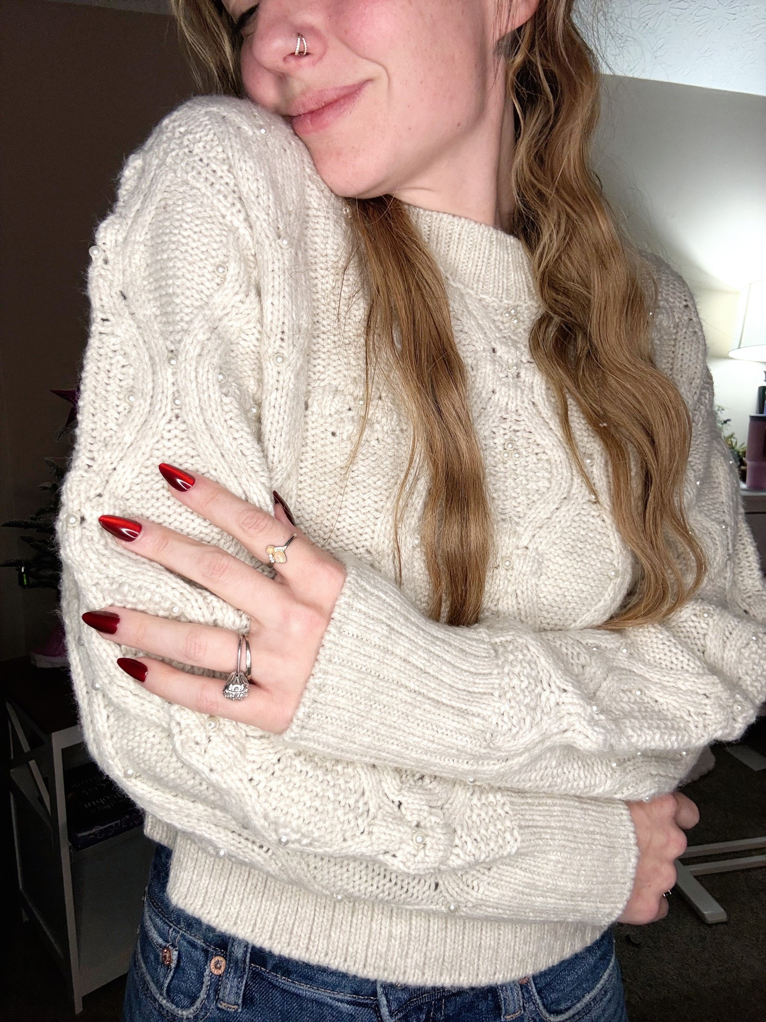 My favorite cozy sweater from American Eagle. Cable knit design with pearl embellishments. Winter wonderland whimsy! Runs true to size. 

#LTKHoliday #LTKootd #LTKSeasonal