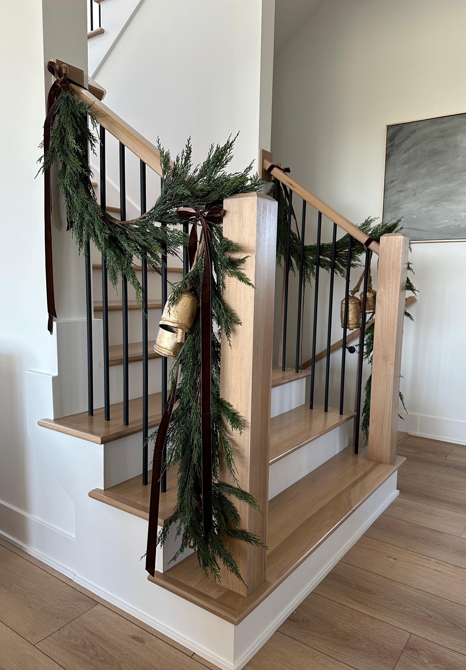 Christmas garland staircase decor 

#LTKHoliday #LTKhome #LTKSeasonal