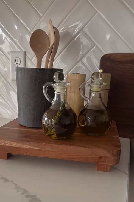 A few recent kitchen decor updates to fill out our countertops 🤍 this utensil holder is absolutely stunning in person and these glass oil cruets are the perfect addition to our countertop decor.

Amazon finds | target home decor | kitchen countertop decor | kitchen finds | home finds 


#LTKhome #LTKunder50