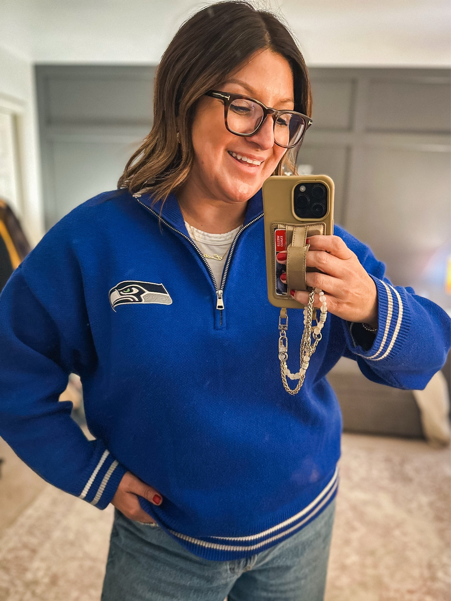 A close up of my Seahawks 1/4 zip. 🏈💙💚

#LTKStyleTip #LTKOver40 #LTKMidsize