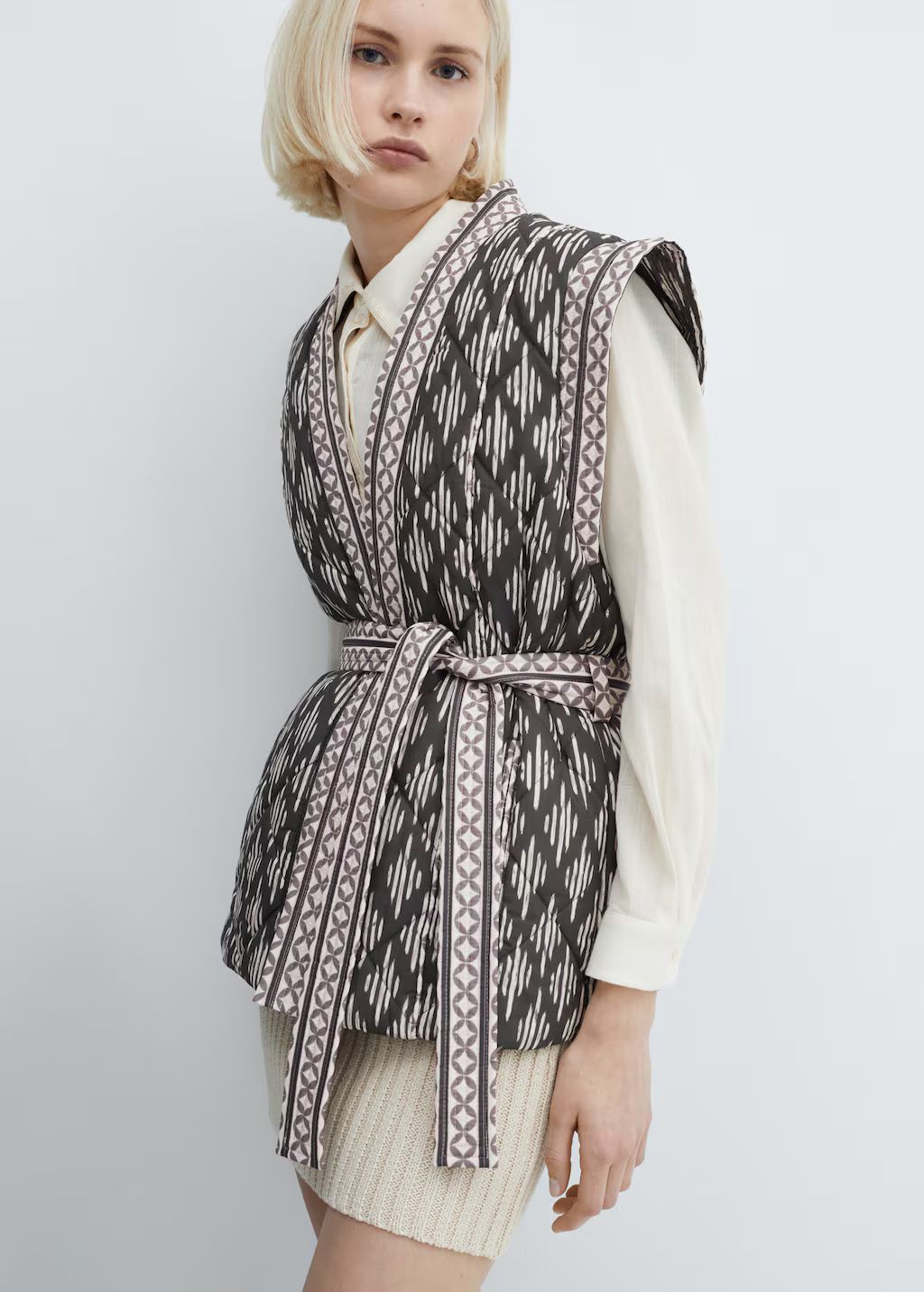 Quilted vest with belt - Woman | MANGO USA | MANGO (US)