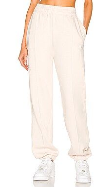 Nike NSW Essential Fleece Sweatpant in Pearl White from Revolve.com | Revolve Clothing (Global)