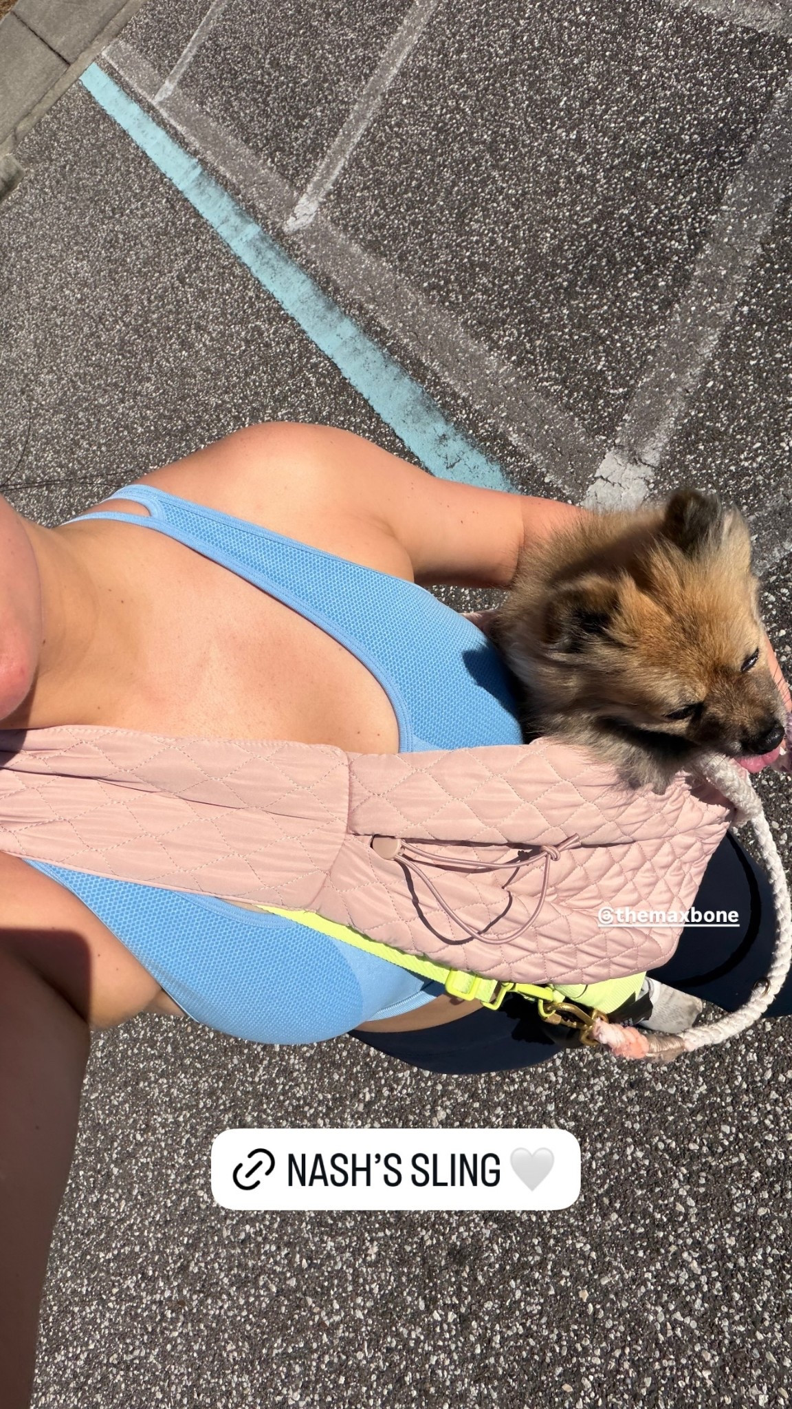 @themaxbone dog sling carrier, small dog carrier, dog sling bag, hands free dog carrier, small dog travel carrier, Pomeranian carrier, pet sling for small dogs, dog mom outfit, casual everyday outfit, comfy travel look, airport outfit with dog, puppy carrier bag