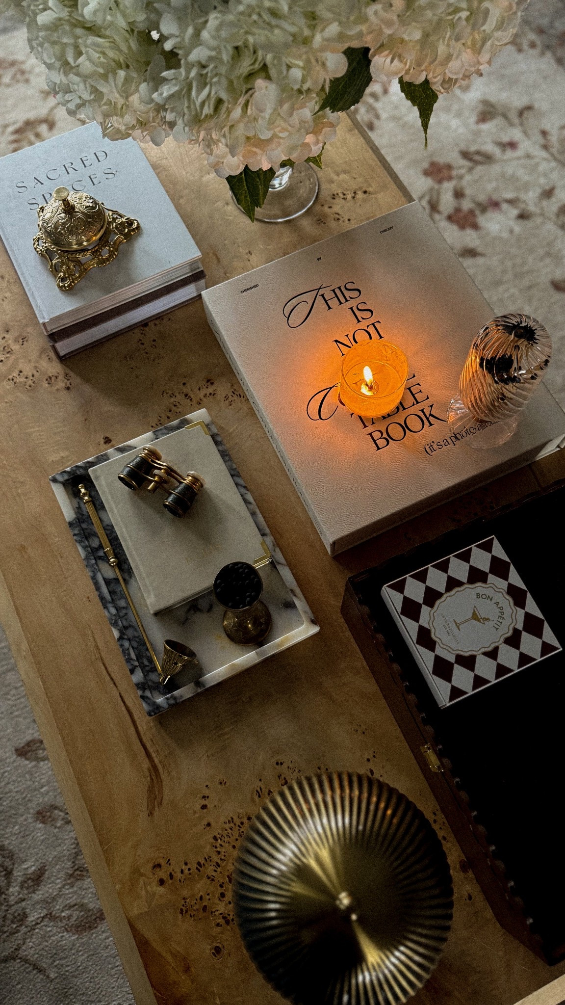 New coffee table styling!  I am starting to bring out my faux spring florals, and I’m so happy things are beginning to bloom around here!  #fauxflowers #spring #springhome #springdecor 

#LTKHome #LTKSeasonal