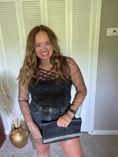 The mesh sparkle blouse adds a bit of Xtra to your fun Summer Fashion. It also looks amazing over a bikini top. I like it over my criss cross tank for added visual interest. Paired with my fav black denim shorts. It has been a hit on my LTK. 

#LTKFestival #LTKFindsUnder50 #LTKParties