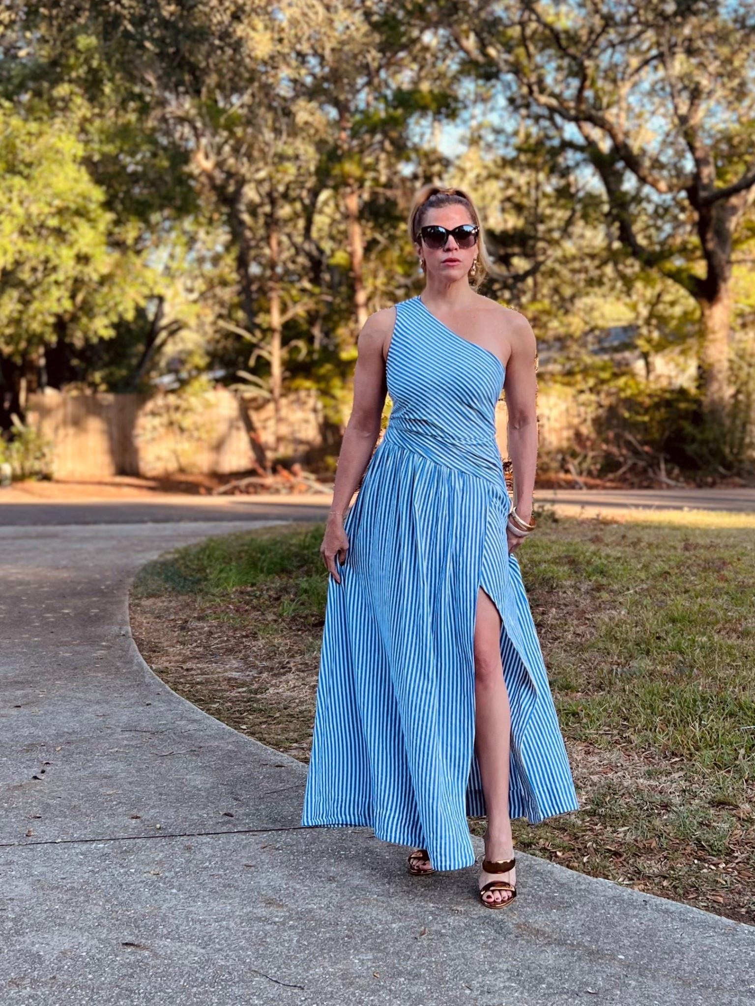 Serving “Florida Fall” energy — where the leaves pretend to change and I’m still in a one-shoulder dress 🍂☀️ 
Effortlessly breezy, perfectly striped, and made for those 80° November days. Who else is faking fall in style? 💙✨

#FloridaFall #EffortlessElegance #OneShoulderStyle #FallButMakeItFlorida #StripesSeason #ResortChic #AutumnInTheSun #OOTDInspo #StyleWithEase #FashionMood

#LTKSeasonal #LTKPetite #LTKStyleTip